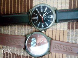 Two Gray Watches With Rubber Straps