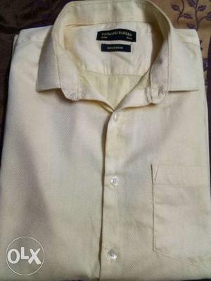 Very pretty light yellow color shirt for just rs 150