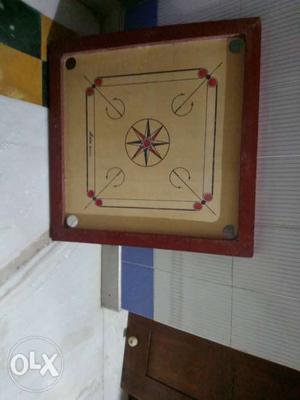 Beige And Brown Wooden Carrom Board