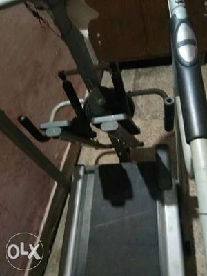 Black And Gray Motorized Treadmill, Twister And Stepper