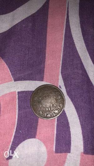 One quarter anna coin of  year George V King