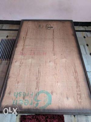 One wooden bed with coirfit mattress 4.5 foot wide