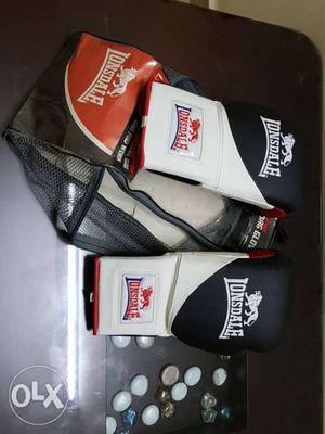 Pair Of Black-white-and-red Lionsdale Punching Gloves