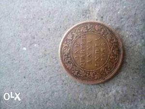 Round  Copper-colored 1/4 Indian Anna Coin