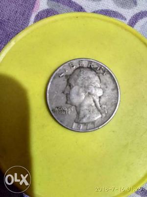  Silver-colored U.S. Dollar Coin