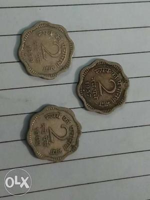 Three Scalloped Edge Silver-colored 2 Indian Paise Coins