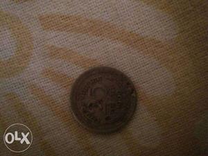 Twenty five paisa coin old 