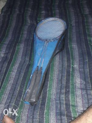 Two Black Badminton Rackets With Pack