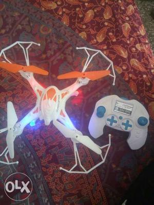 White And Orange Drone Quadcopter