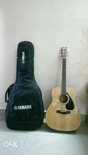 Yamaha F310 Guitar with bag and picks