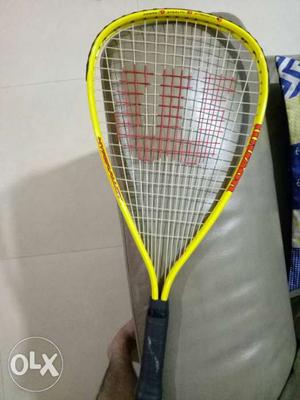 Black, Yellow, And Red Wilson Racquetball Racket