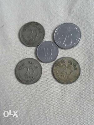 Five Silver-colored 25 And 10 Indian Paise Coins