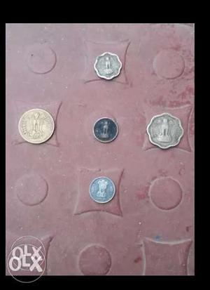 Five Silver-colored And Gold-colored Indian Coins