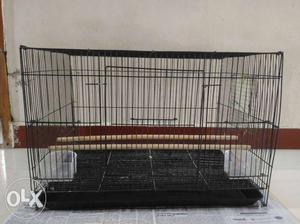 Less used bird's cage for sale.