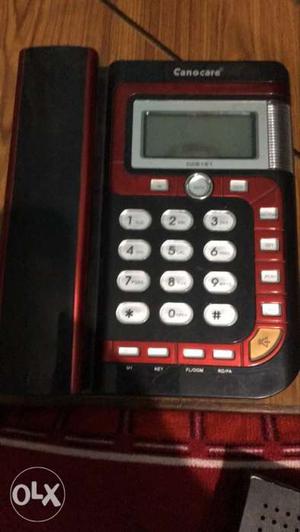 Red And Black Texas Instruments TI-84 Plus Calculator