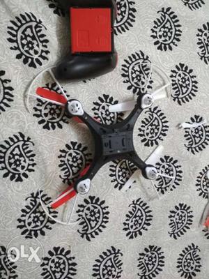 Red, Black, And White Quadcopter