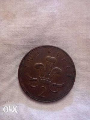 Round Bronze-colored 2 Pence Coin