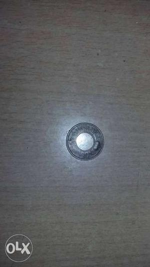 Round Silver-colored Pice Coin