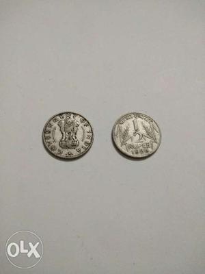 Two Round Silver-colored 1 Indian Coins