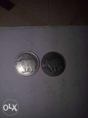 Two Round Silver-colored 25 Indian Paisecoins