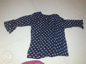 Blue And White ladies top size S.