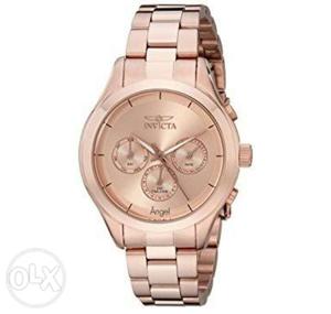 Brand is Invicta. Rose gold color. This is for women.