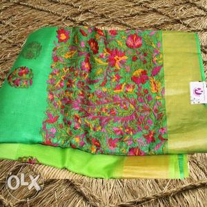 Green, Pink, And Yellow Floral Textile