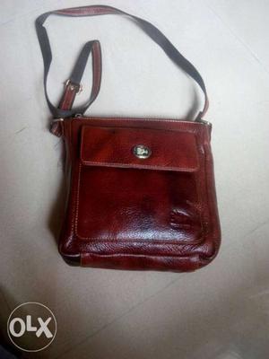 Leather sling bag...3 compartment. long sling