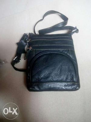 Leather sling bag...black colour 2 pcs available