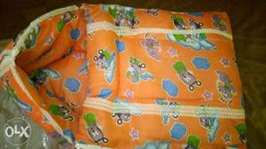 Orange colour baby carrier