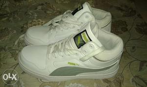 Pair Of White Low-top Sneakers