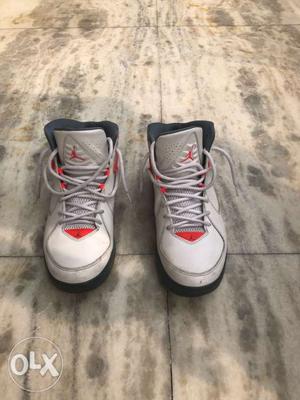 Pair Of White-and-red Air Jordan Shoes