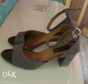 Pair Of grey-and-brown Wedge Sandals