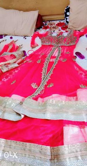 Pink net suit with long skirt very beautiful work