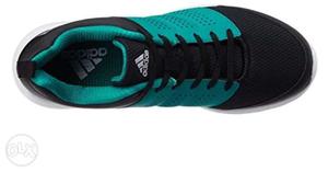 Unpaired Teal And Black Adidas Low-top Running Shoe