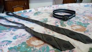 2 ties, 1 belt of Somerville School, Noida