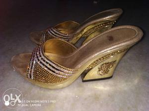 4 inches golden bridal sandals.2 times used.size