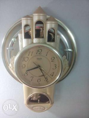 Antique wall clock in perfect condition with ease