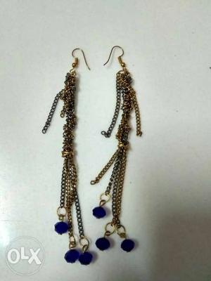 Gold and silver braided earring