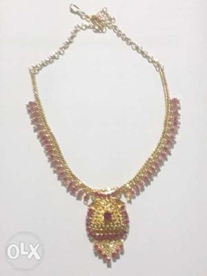 Guarantee necklace with ruby stone
