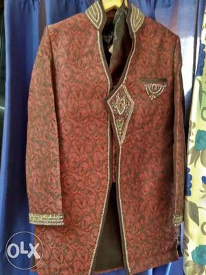 One time used sherwani with dhoti and broach and