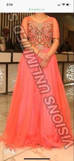 Orange gown for sale. worn only once.