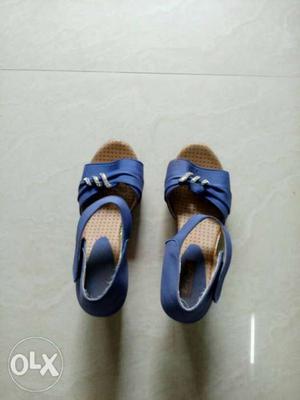 Pair Of Blue-and-black Sandals