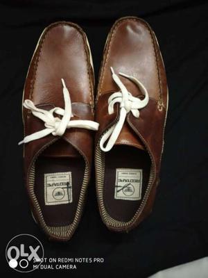 Pair Of Brown Sperry Boat Shoes