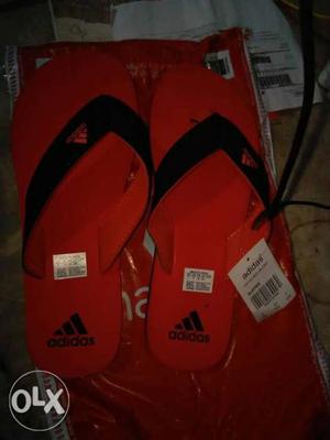 Pair Of Red Adidas Flip-flops