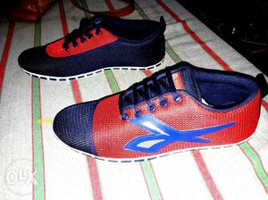 Pair Of Red-and-blue Nike Running Shoes