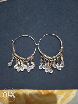 Pair Of Silver-colored Hoop Earrings