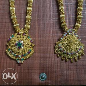 Two Gold-colored Jeweled Necklaces