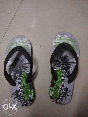 Two Gray-green-and-black Relaxo Flip-flops