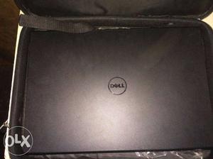 A dell unused laptop wid hanging bag ina new